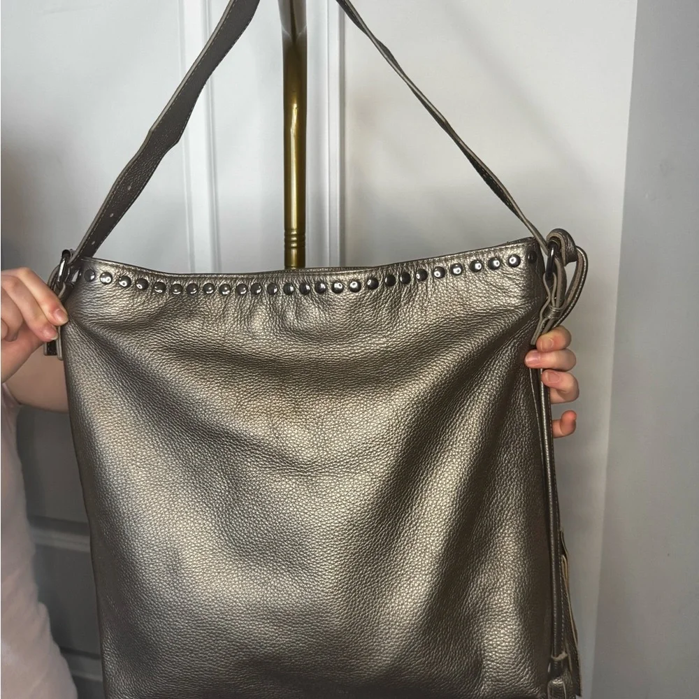 LAGGO Metallic Pewter Leather Hobo Bag with Tassel
